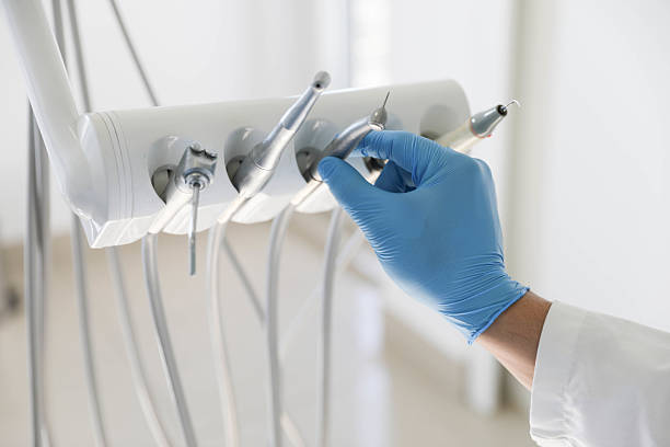 Professional Tooth Extraction technician working in La Marque, TX